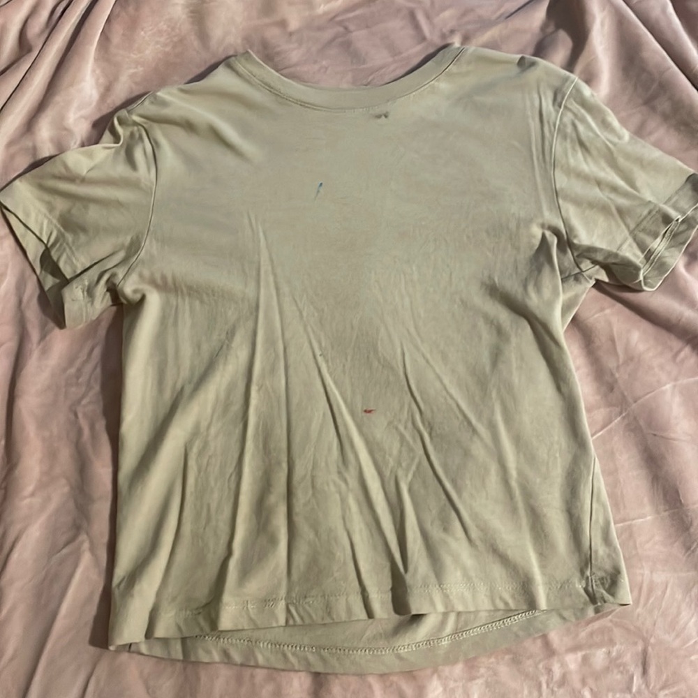 Old Navy plain tan shirt. Slightly cropped to make you give BODY!!!